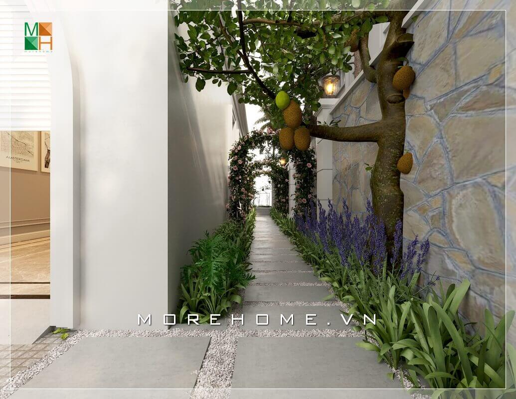 Mẫu thiết kế kiến trúc biệt thự sân vườn đẹp, độc đáo. Ý tưởng thiết kế lối đi hông nhà sân vườn ấn tượng với 2 hàng hoa khoe sắc với đá lát nổi bật. thiết kế biệt thự