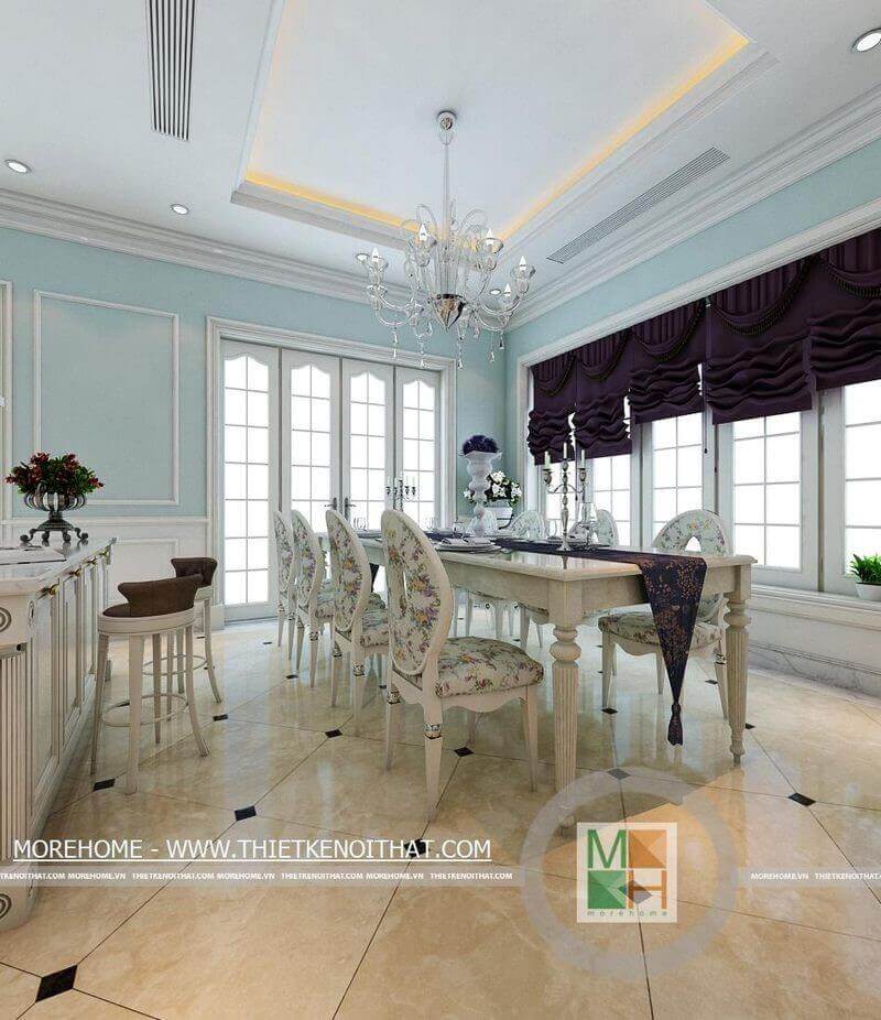 Khu vực phòng ăn được thiết kế sang trọng với tone màu trắng từ nội thất kết hợp với màu xanh-tím của tường và rèm tạo không gian phòng hài hòa hơn